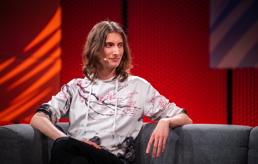 Nymaera sitting on a couch during an interview